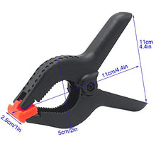 Load image into Gallery viewer, CESFONJER 4 Pcs – 4.5 Inch Spring Clamps, Heavy Duty Plastic Muslin Clamps for Background Muslin, Canvas, Paper, Chroma Key Screen, Heavy Duty Clip, Photo Studio and Any More.