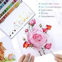 Load image into Gallery viewer, Watercolor Paint Set, Emooqi 42 Premium Colors + 6 Metallic Colors Pigment+ 2 Hook Line Pen+ 3 Water Brushes +10 Sheets of Water Color Paper, Richly Pigmented Portable Painting Art Painting
